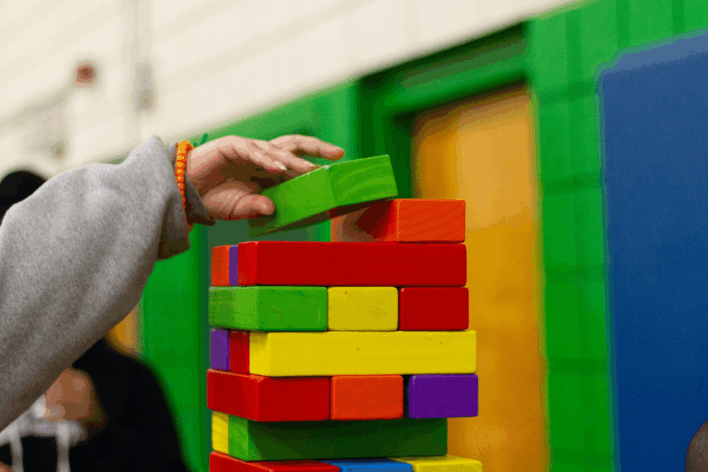 A child stacking toy bricks