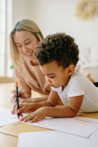 a little boy colouring