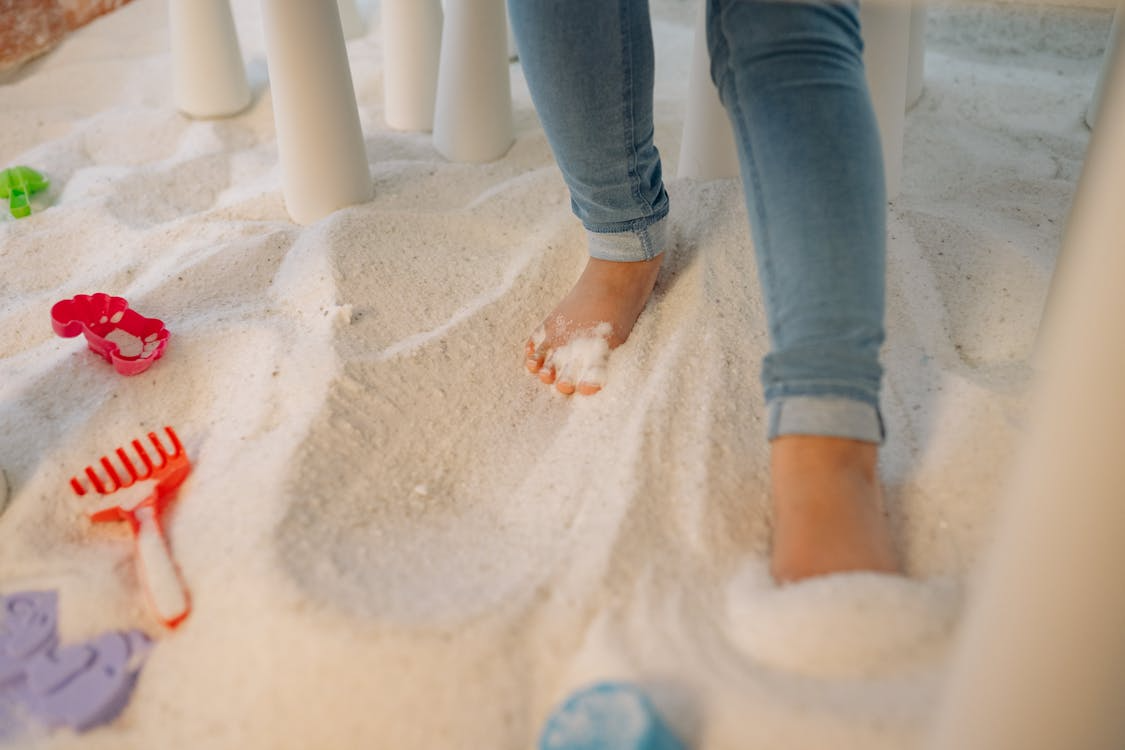 A child playing in sand