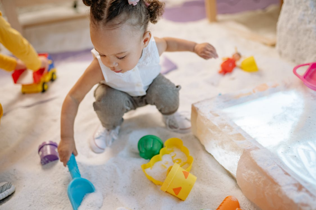 A child engaging in sensory play1
