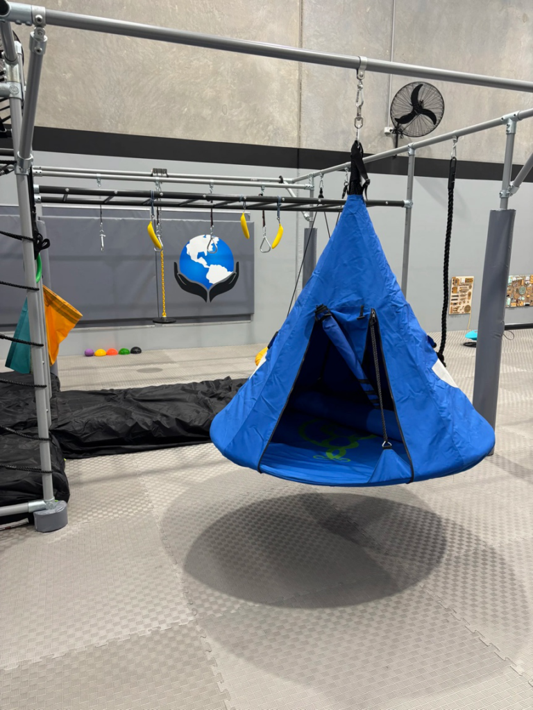 Hanging sensory seat for children at a respite play centre in Melbourne